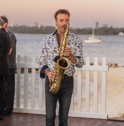 Profile image of Man Plays Sax